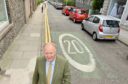 The 20mph speed limit in the Rosemount area, introduced as part of Spaces for People, is planned to be retained on the grounds that it makes the community safer. Pictured is Councillor Bill Cormie at the top of Short Loanings, at the junction with Rosemount Place. 
Picture by Kami Thomson.