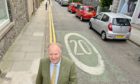 The 20mph speed limit in the Rosemount area, introduced as part of Spaces for People, is planned to be retained on the grounds that it makes the community safer. Pictured is Councillor Bill Cormie at the top of Short Loanings, at the junction with Rosemount Place. 
Picture by Kami Thomson.