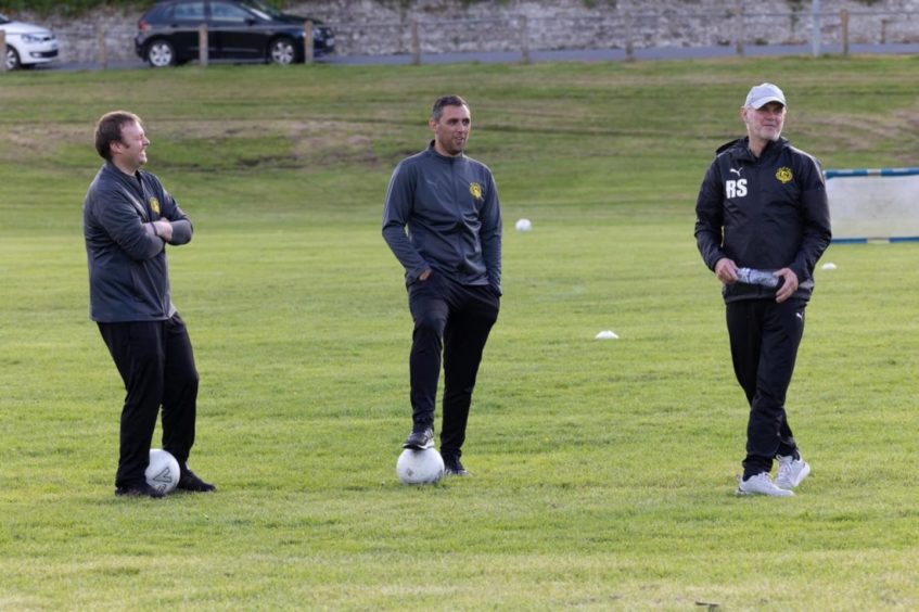 Ronnie Sharp (right) with coaches Stuart Finnie (left) and Brian Macleod during Nairn County's pre-season training. Picture by Kenny Macleod.