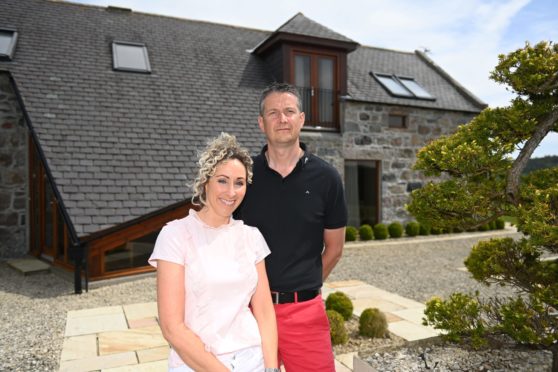 Teresa and John Anderson outside Ard Na Moy, at Glassel, Banchory.