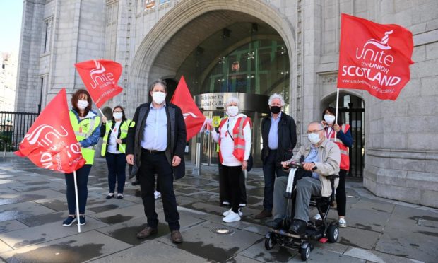 Council workers on strike outside Marischal College