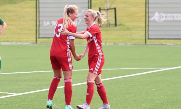 Aberdeen's Francesca Ogilvie, left, and Loren Campbell celebrating.