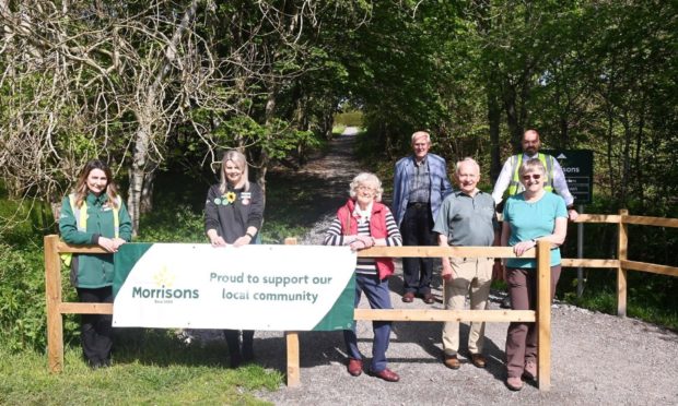 Pictured are from left, Aysha Hutcheon, Laura Brown, Morag Parr, Dick Jennings, David Culshaw, Liz Culshaw and Store Manager Stuart Aitken at the new path from the Deeside Way to Morrisons Supermarket in Banchory.