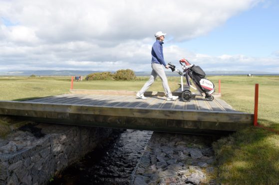 Nairn's Calum Scott on his home course on his way to shooting a four under par round.   Picture by Sandy McCook