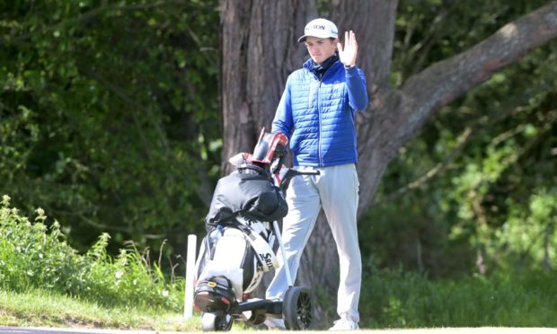 Nairn player Calum Scott on his home course on his way to shooting a four under par round. Picture by Sandy McCook