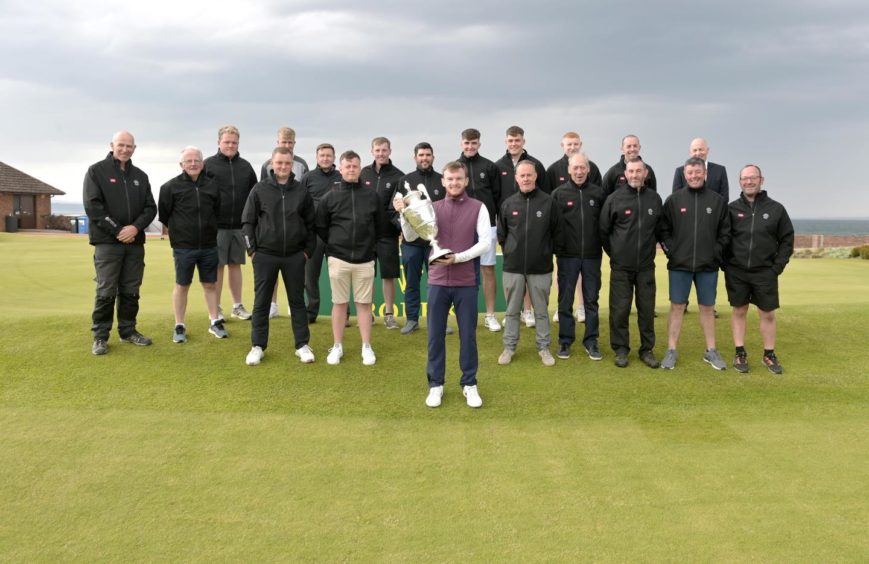 Champion Laird Shepherd with staff from Nairn Golf Club.