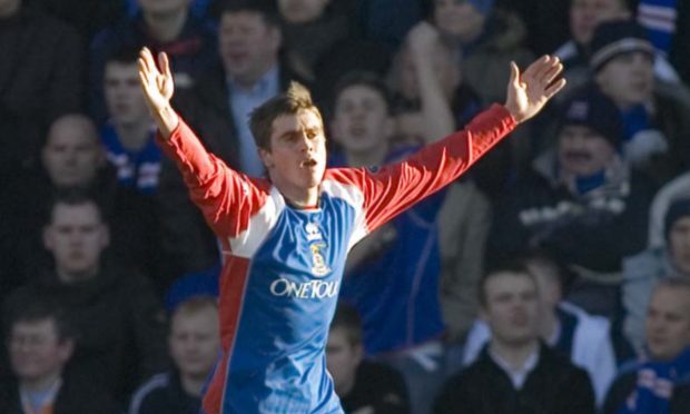 Craig Dargo after scoring for Caley Thistle against Rangers in 2006.