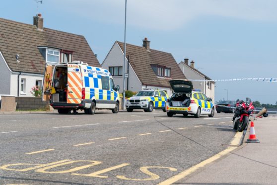 Police at the scene of the motorbike crash in Thornhill Road, Elgin.