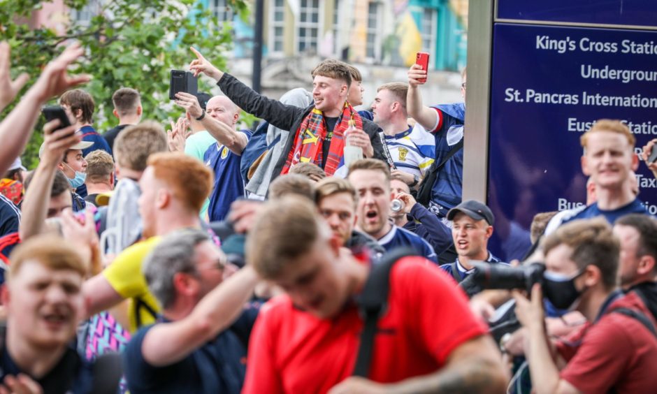 Scotland fans at London's Kings Cross Station ahead of the match between Scotland and England.