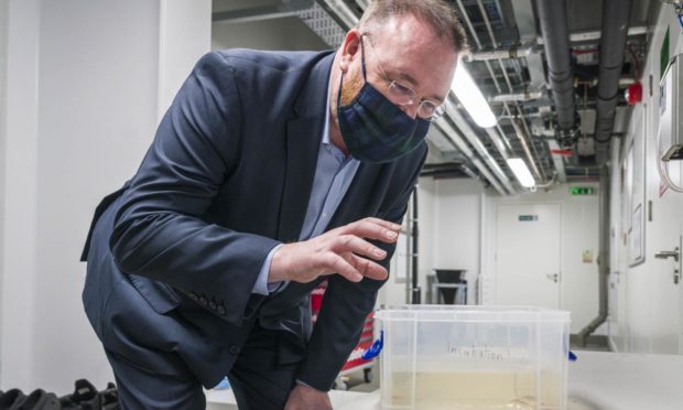 Scotland Office Minister David Duguid at Barcaldine hatchery.