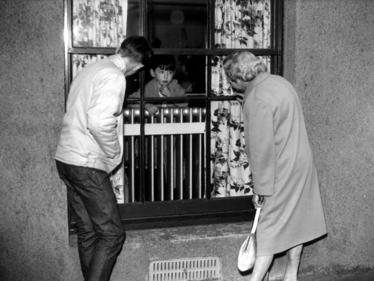 Young child visted from outside the City Hospital during Aberdeen Typhoid epidemic in1964. 