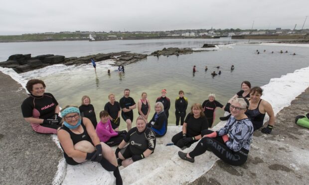 Some of Wick's Kool Water Swimmers, with organiser Patty Coghill,
(left with the blue head band), at the North Baths.