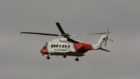 A Coastguard helicopter that was conducting a training exercise in the area joined the search.