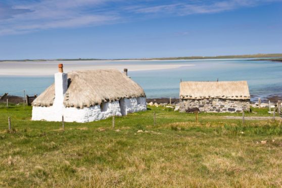 Croft houses near Traigh Ear beach - North Uist. Shutterstock