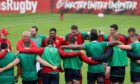 Head coach Warren Gatland leads a player huddle in Lions training this week.