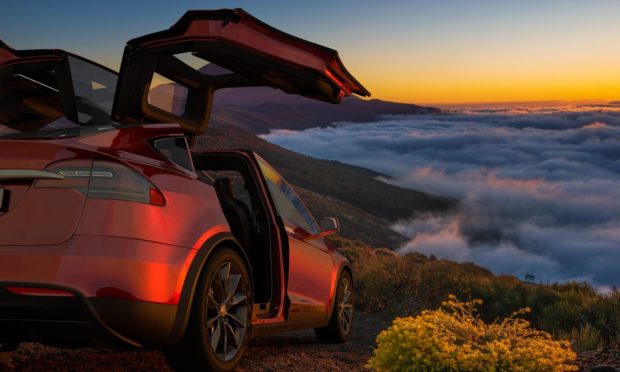 Tesla model X: a versatile recreational vehicle that handles off-road terrain, too.