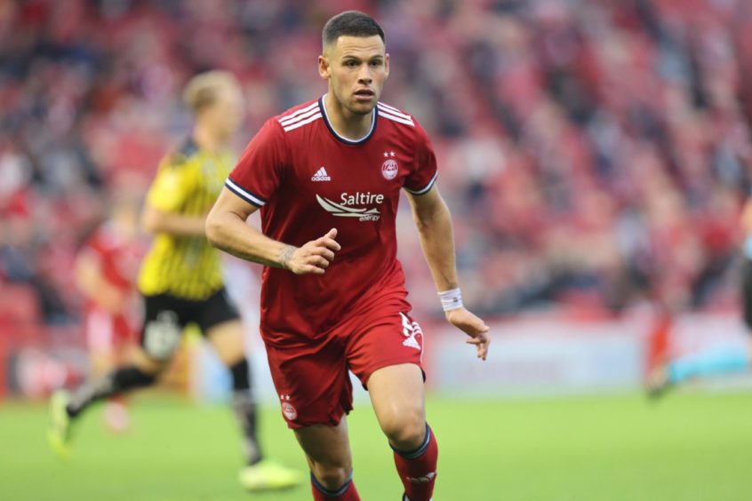 Christian Ramirez in Aberdeen's 2021/22 home kit. 