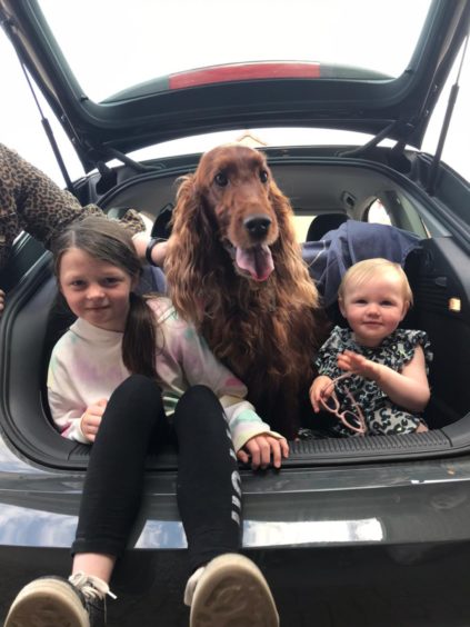 Shelley Kingsley, from Turriff, sent in this photo of Jessica and Grace with red setter Rubie.