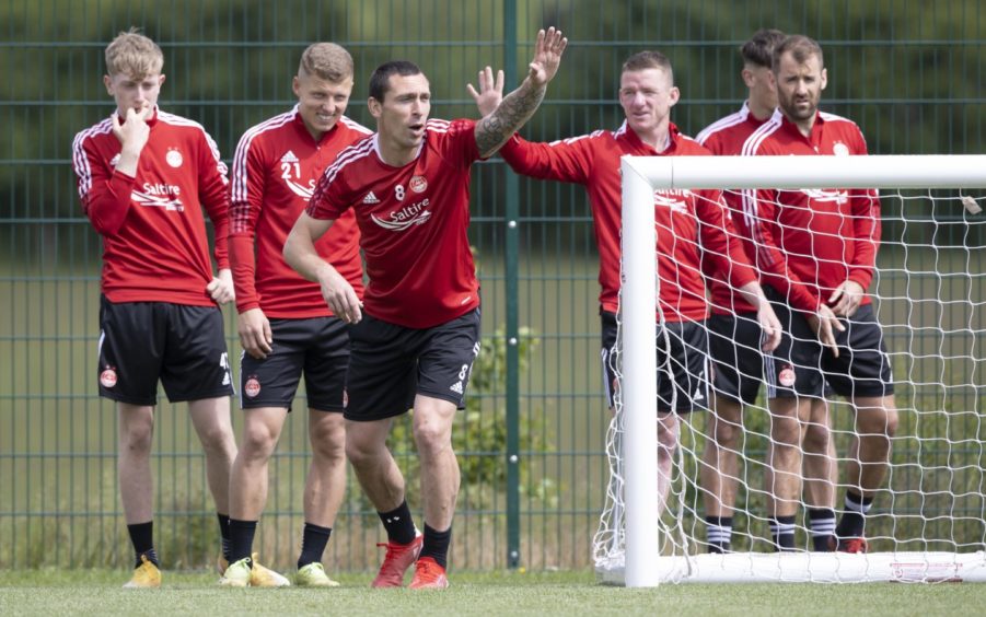 Summer signing Scott Brown taking part in a drill.