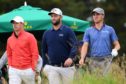 The banner group (L-R) Rory McIlroy, Jon Rahm and Justin Thomas.