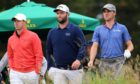 The banner group (L-R) Rory McIlroy, Jon Rahm and Justin Thomas.