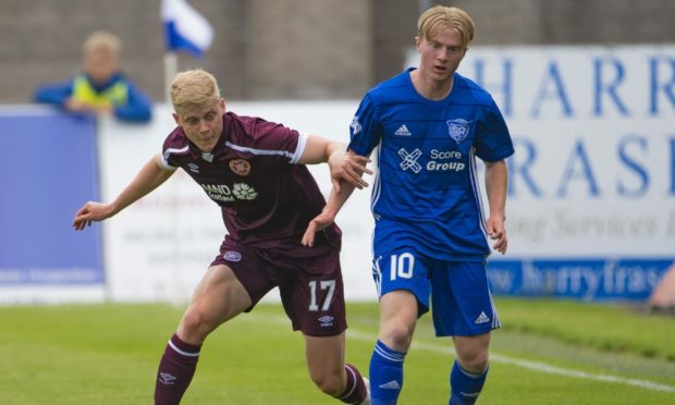 Lyall Cameron in action against Hearts