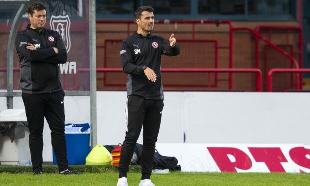 Brora Rangers manager Steven Mackay on the touchline at Dens Park