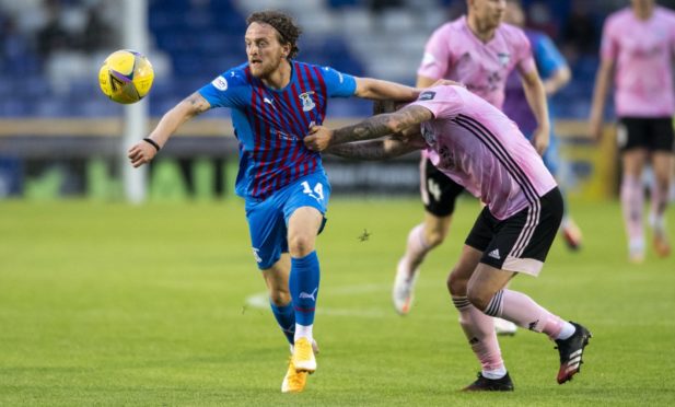 Tom Walsh in action for Inverness.