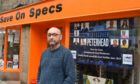 Keith Bennett outside his glasses shop, now called Spex Shop. He is offering business owners who vote down the renewal of the Peterhead Bid £100 store credit.