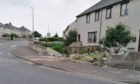 A car crashed into a garden wall following a police chase in Shetland.