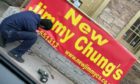 The sign appearing for the new Jimmy Chung's.