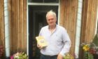 Jim Oliver with his new book, ready for the launch at Tain's Platform 1864 on Saturday.