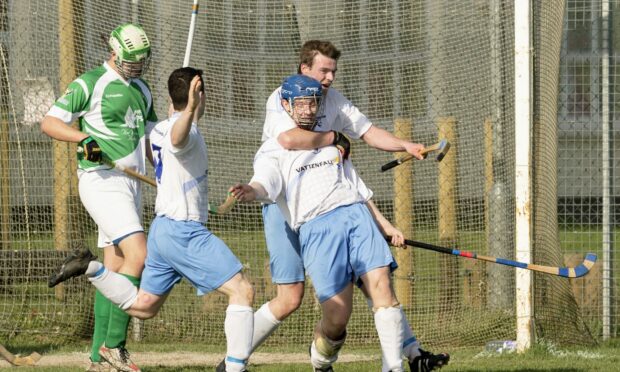 Will Cowie, pictured celebrating scoring a hat-trick for Skye, is sidelined for the rest of the campaign.
