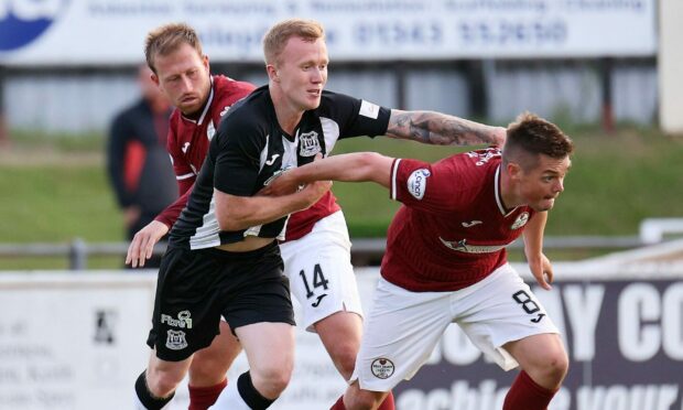 Elgin City ace Conor O'Keefe, left, is determined to help the team beat Stranraer and Edinburgh City over the next week.