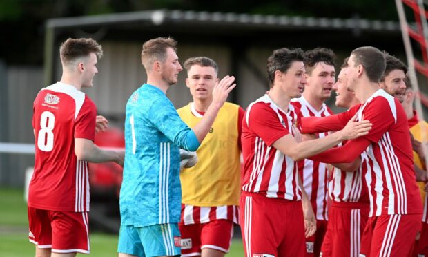 Formartine players celebrate their penalty shoot-out win against Buckie in the Evening Express Aberdeenshire Cup