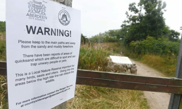 The warning sign at Deemouth. Picture by Chris Sumner
