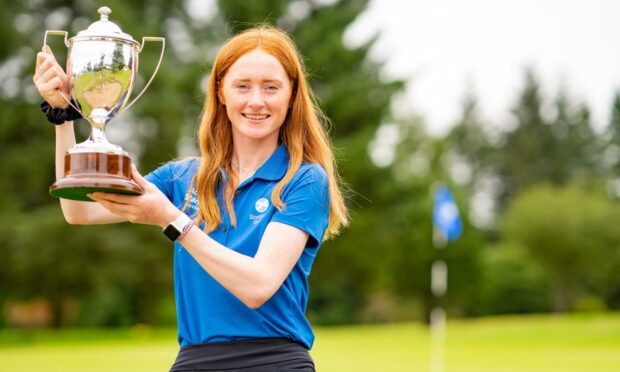 Aboyne's Carmen Griffiths celebrates with the trophy.