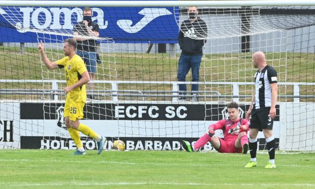 Jordan White celebrates his goal for Ross County at Borough Briggs.  Pictures by Jason Hedges