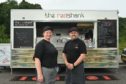 Anne Marie and Jamie from The Redshank standing in front of their seafood street food van in Inverness