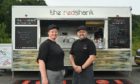 Anne Marie and Jamie from The Redshank standing in front of their seafood street food van in Inverness