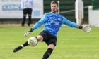 Buckie goalkeeper Kevin Main in action against Aberdeen in the EE Aberdeenshire Cup.