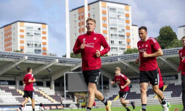 Ross McCrorie trains with his Dons teammates at the Bravida Arena.