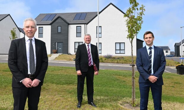 Scotia Homes' Knockhall site in Newburgh. L-R Martin Bruce ( managing director)  Gary Gerard  ( chairman ) and Graham Reid ( land and development director).