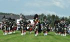 The Lonach Pipe Band at the Dufftown Highland Games in 2019