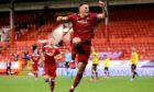 Aberdeen's Christian Ramirez celebrates scoring on his debut.