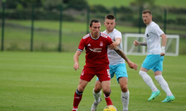 To go with story by Danny Law. Aberdeen midfielder Scott Brown in action during the 1-1 friendly draw against Caley Thistle.  Picture shows; Aberdeen midfielder Scott Brown. Cormack Park. Supplied by Aberdeen FC Date; 08/07/2021