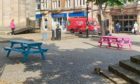 These multi-coloured benches in Elgin town centre have caused a stir.