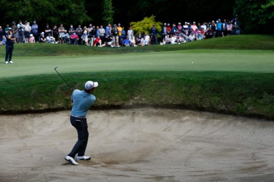 Grant Forrest of plays out of a bunker at the 14th hole at Mount Juliet.