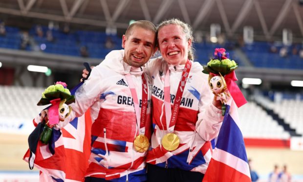Neil Fachie with wife Lora, also a gold medallist at the Tokyo Paralympics.