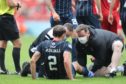 Connor Randall was forced off with an injury at Pittodrie